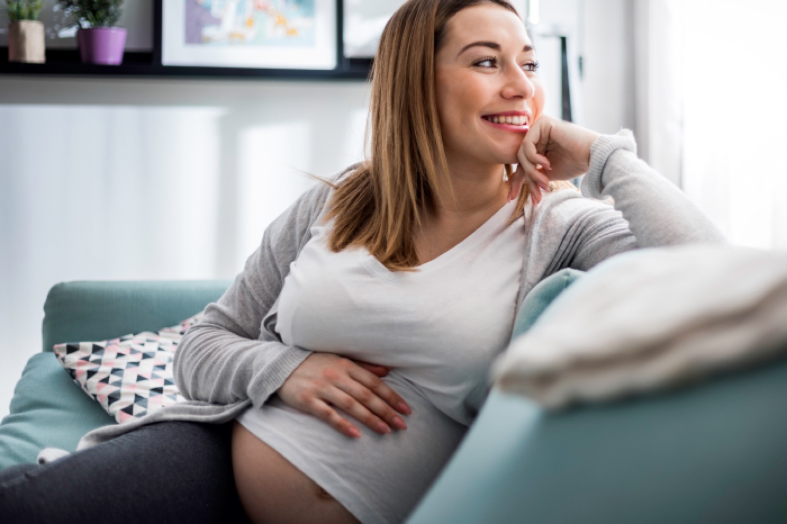 An expectant mother resting at home
